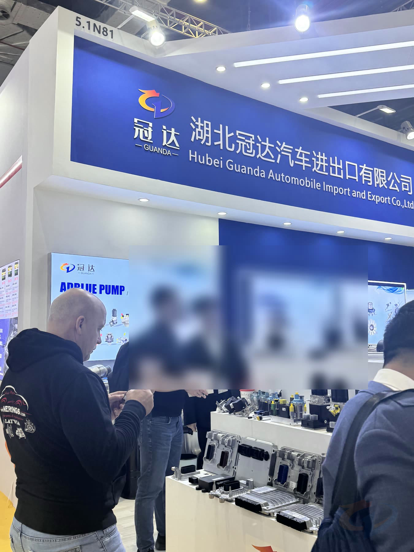 Guanda exhibition booth with products displayed for customer discussion